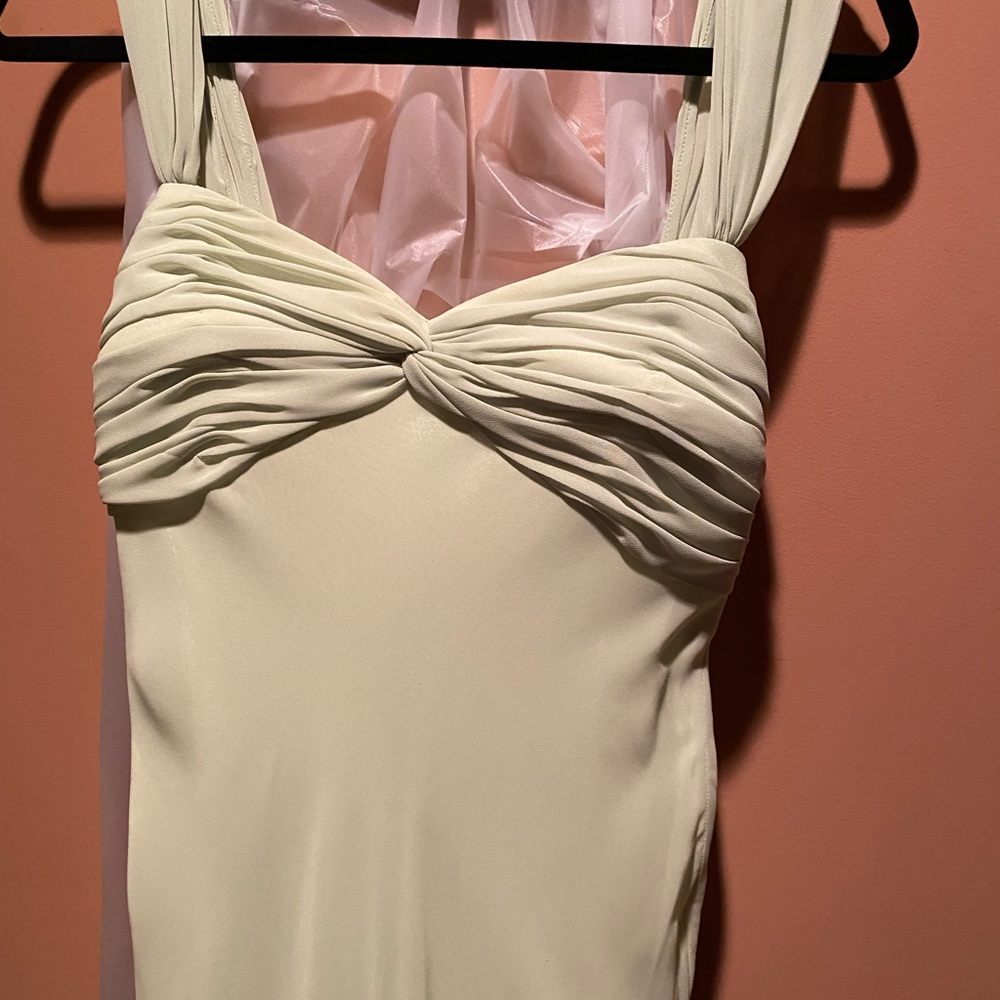 Formal dress worn once and stored in garment bag.